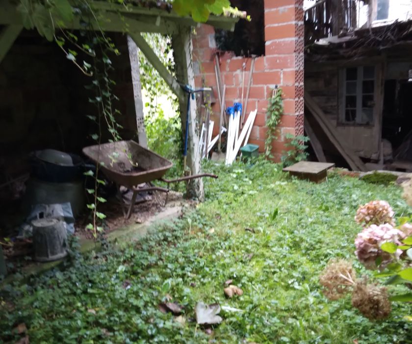 Grange avec garage et terrain