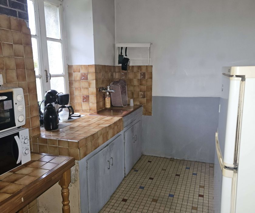 Ensemble immobilier constitué de deux maisons